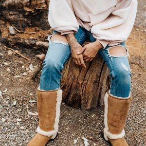 Used UGG Sunburst tall women boots size 7